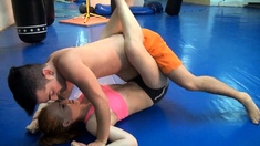 She wrestles a guy and beats him off